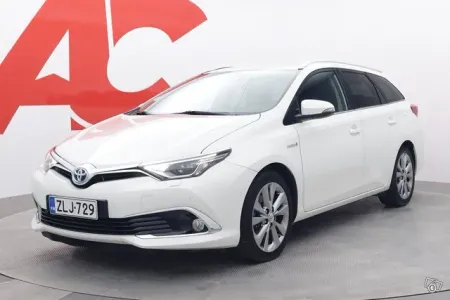 Toyota Auris Touring Sports 1,8 Hybrid Premium - PUOLINAHAT / 1-OMISTAJA / LOHKOLÄM. / NAVI / HUIPPUVARUSTELTU PREMIUM MALLI / UUDET KESÄRENKAAT